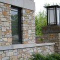 The exterior walls of a building outfitted with Cascade stone veneer from Halquist's Ledge Collection.