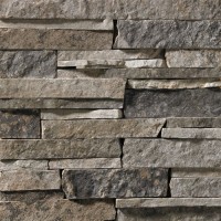 A dark stone veneer for use in interiors as well as the outdoors. This building stone features dark grays with some subtle brown accents.