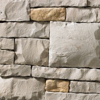 A light grey stone veneer with golden accents perfect for any hardscape idea on the exterior or interior of any home or landscape.