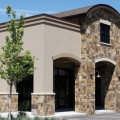 The exterior walls and columns of a building outfitted with Copenhagen stone veneer from Halquist's Castlestone Collection.