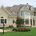 The interior walls of a home outfitted with Dimensional Chalet Buff stone veneer from Halquist's Castlestone Collection.