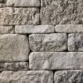 A grey and tan stone veneer perfect for any hardscape idea on the exterior or interior of any home or landscape.