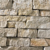 A grey and tan stone veneer with a rustic appearance perfect for any hardscape idea on the exterior or interior of any home or landscape.