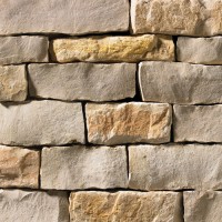 A grey and tan stone veneer perfect for any hardscape idea on the exterior or interior of any home or landscape.