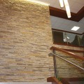 Stone veneer covers an interior wall.