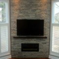 An interior wall built with Lannon Grey building stone.