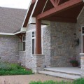 The exterior walls of a home outfitted with the Maple Ridge stone veneer from Halquist's Ledge Collection