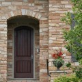 The exterior walls of a home outfitted with the Old Griz stone veneer from Halquist's Ledge Collection.