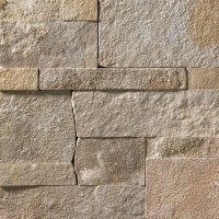 A grey and tan stone veneer with a slightly warm hue and a few rose-colored accents perfect for any hardscape idea on the exterior or interior of any home or landscape.