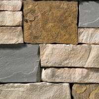 A stone veneer with light, warm hues and brown and grey modules perfect for any hardscape idea on the exterior or interior of any home or landscape.