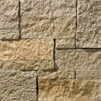 A grey and tan stone veneer perfect for any hardscape idea on the exterior or interior of any home or landscape.