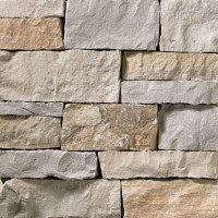 A light grey and tan stone veneer perfect for any hardscape idea on the exterior or interior of any home or landscape.